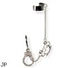 Ear stud with dangling hand cuff's and brass knuckles  on chain with Cuff