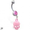 Jeweled belly ring with dangling pink skull