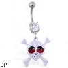 Navel ring with dangling white skull with flame eyes