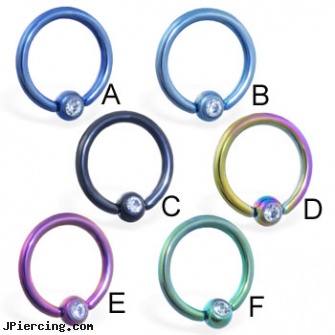 Colored steel/titanium anodized captive bead ring with clear gem, 16 ga, ear piercing flesh colored hider jewlrey, ear piercing flesh colored hider jewlery, colored heavy gauge tongue barbells, anodized body navel ring, charms for captive belly rings