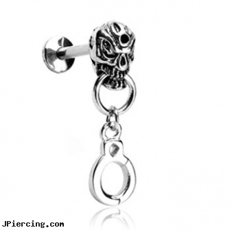 Labret Stud With Skull Head And Dangling Handcuff, 14 Ga, labret peircing faq, labret peircing jewlery, labret info, belly button stud, fake nose studs