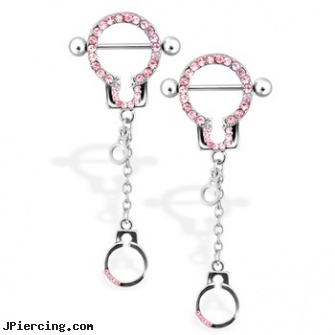 Pair Of Pink Gem Paved Nipple Rings with Dangling Handcuffs, torn penis piercing repair, pink nipple rings, pretty in pink, pink tattoos, self nipple piercing