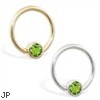 14K yellow gold captive bead ring with Peridot