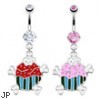 Jeweled belly ring with dangling cupcake and crossbones