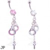 Navel ring with dangling jeweled handcuffs and key