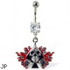 Navel ring with dangling skull with spades, dice, and flame