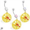 Navel ring with dangling yellow firefighter's emblem