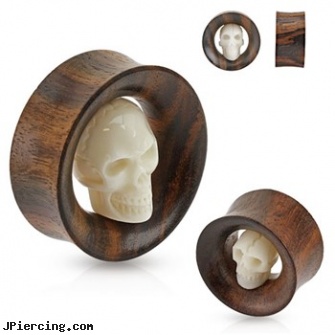 Pair Of Carved Skull Inside Organic Sono Wood Saddle Fit Tunnels, torn penis piercing repair, skull labret, skull navel ring, skull belly button ring, pictures of the insides of tatto and piercing places