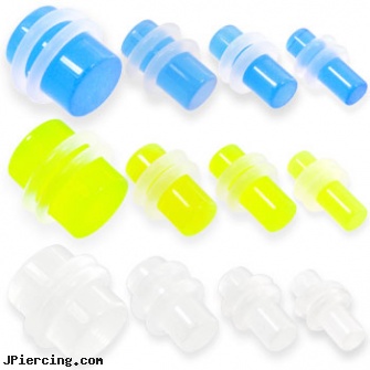 Pair Of Glow-In-The-Dark Plugs with Clear O-Rings, torn penis piercing repair, glow in the dark belly button rings, glow stick tongue rings, glow in the dark nose rings, dark ring around nipple