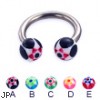 Titanium circular barbell with acrylic star balls, 12 ga