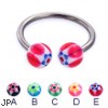 Titanium circular barbell with acrylic star balls, 14 ga